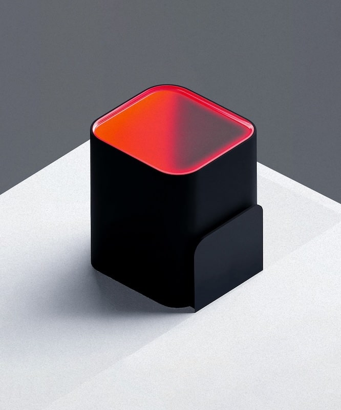 Red and black 3D cube mockup on a table